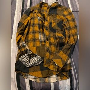 Mustard yellow flannel. Size small. Lightly worn.